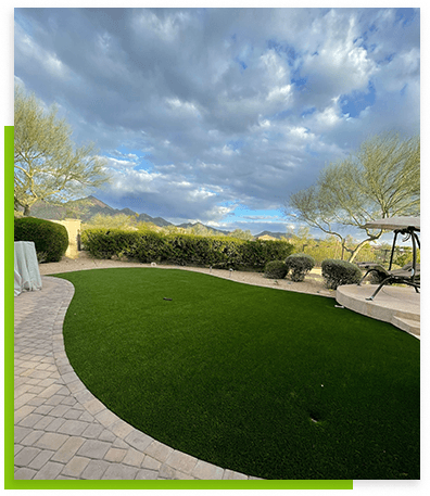 green-lawn-with-a-view-of-a-cloudy-sky