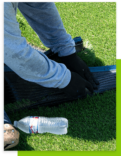 worker-placing-down-turf