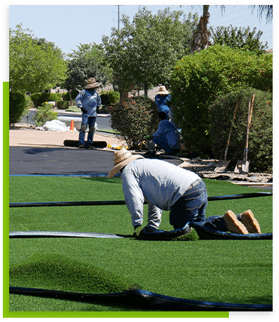 worker-working-on-the-green-grass