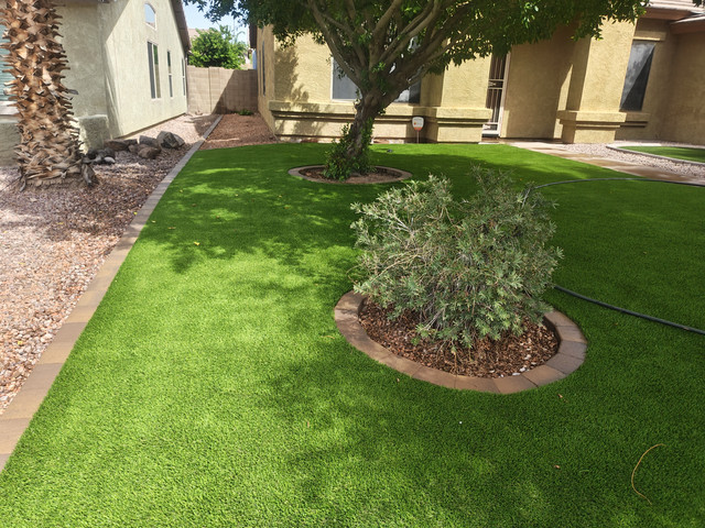 Completed Always Green Turf landscape with planting beds and mature trees